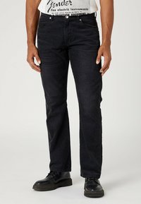 Wrangler Tygbyxor - black