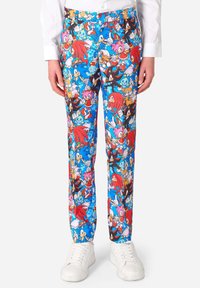 Pantalons colorés avec un imprimé intégral de personnages animés sur un fond bleu. Fabriqués en tissu léger, conçus pour le confort.