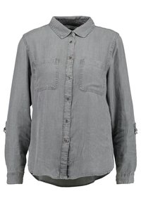Camicetta in denim grigio con colletto classico, due tasche sul petto, chiusura a bottoni e cinturini sulle maniche regolabili. Tessuto morbido con una vestibilità rilassata.