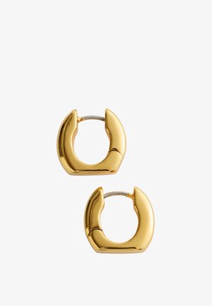 Mastywne złote kolczyki-koła z zawiasowym zapięciem, o gładkim, wypolerowanym wykończeniu i nowoczesnym, lekko kwadratowym kształcie.