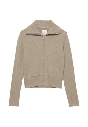 Sweater beige corto con zip, dotato di colletto e polsini a coste, realizzato in tessuto morbido. Presenta una zip argentata e un design semplice.