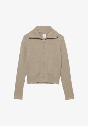 Gekürzter beiger Reißverschluss-Pullover mit geripptem Kragen und Bündchen, aus weichem Stoff. Verfügt über einen silbernen Reißverschluss und ein schlichtes Design.