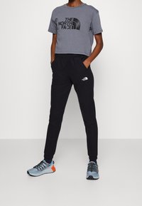 The North Face Träningsbyxor - black