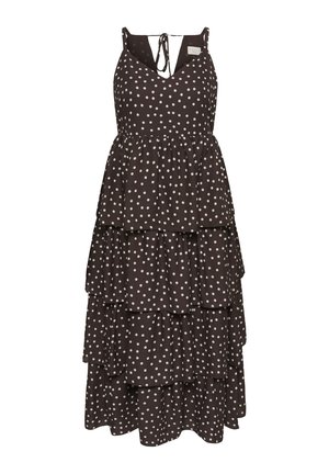 Rochie neagră fără mâneci, cu volane, buline albe, decolteu în V și închidere cu fundă la spate.