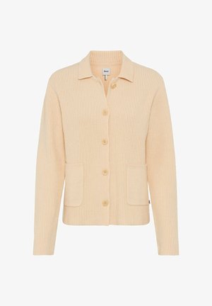 Beige gebreide cardigan met een kraag, vijf knopen en twee voorzakken. Heeft een geribbelde textuur en een losse pasvorm.
