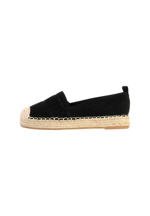 Chaussure espadrille noire à enfiler avec semelle en jute beige tissée et semelle en caoutchouc, dotée d’une tige en tissu texturé et d’un bout arrondi.