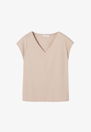 Beżowa bluzka z krótkim rękawem, dekoltem w kształcie litery V i centralnym szwem, o swobodnym, pudełkowym kroju oraz małą metką marki wewnątrz dekoltu.