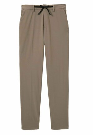 Pantalones beige de tela ligera, con un corte recto, cinturilla elástica con cordón negro y bolsillos laterales.
