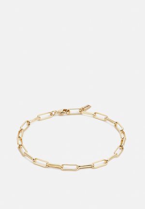 Kuldne kett käevõru, milles on ristkülikukujulised ja ovaalsed lingid, millel on sile viimistlus. Sisaldab turvalist klambrit ja väikest brändi sildikest.