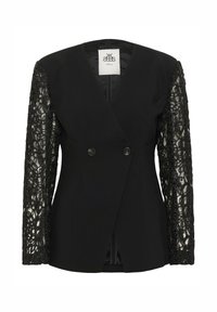 Sort blazer med dyb V-hals, dobbeltknaplukning og intrikate sorte blondesleeves, der skaber en tekstureret kontrast. Glat stof på kroppen.