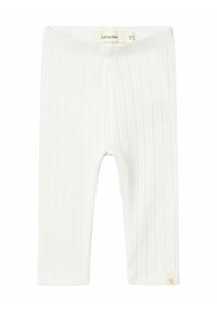 Leggings blancs côtelés en matériau doux, dotés d'une taille plate et d'une petite étiquette de marque au bord.