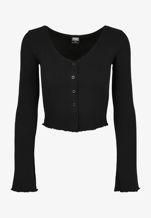 Cárdigan recortado negro, textura acanalada, mangas largas con puños con volantes, escote en V profundo, cinco botones negros en el frente, diseño informal.