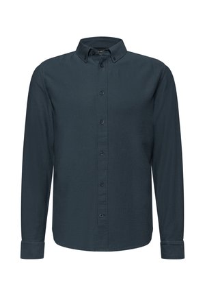 Camicia a maniche lunghe di colore blu scuro realizzata in cotone testurizzato, con colletto con bottoni, chiusura frontale con bottoni su tutta la lunghezza e polsini con bottone.
