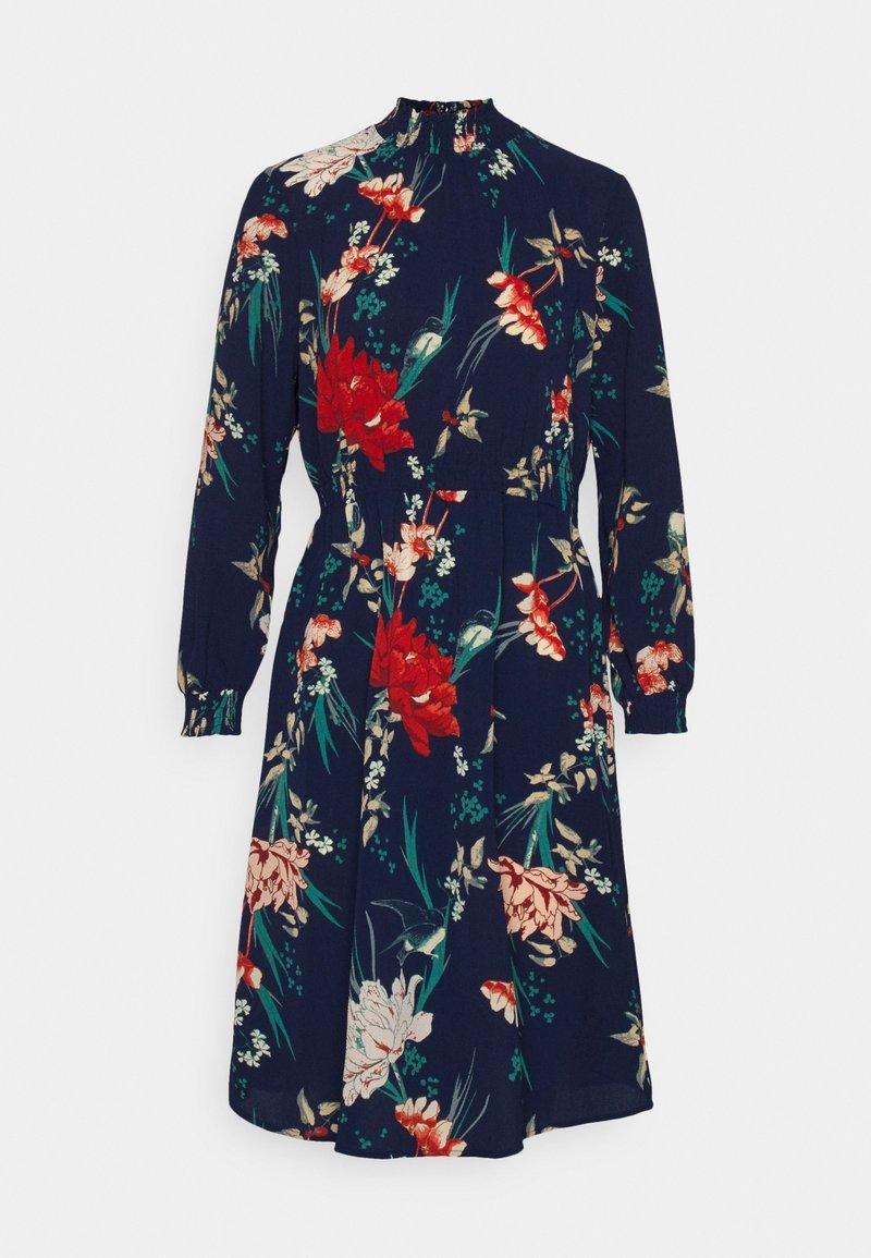 Robe bleu marine à manches longues avec col montant et imprimé floral rouge, blanc et vert, taille cintrée et jupe longueur genou.