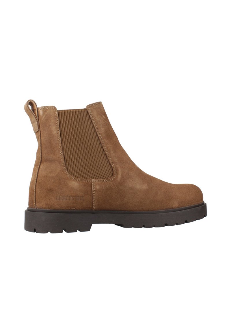 Braune Wildleder Chelsea-Boots mit elastischen Seiteneinsätzen, strukturiertem Finish und einer robusten schwarzen Gummisohle. Mit Zuglasche hinten.