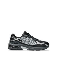 Black and silver athletic shoe featuring a breathable mesh upper, textured overlays, thick rubber sole, and lace-up closure.