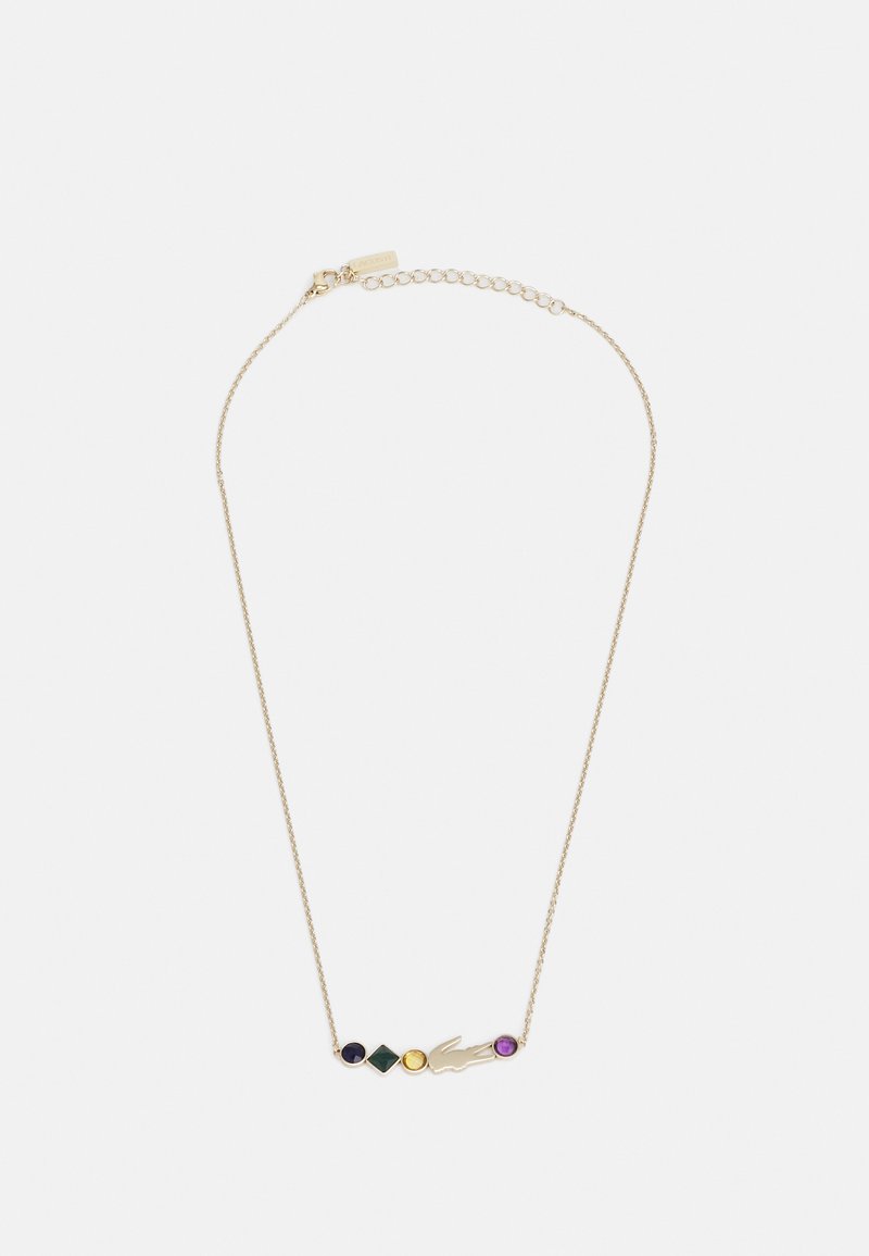 Gouden ketting met een slanke schakel en een handsilhouet, versierd met vier edelstenen in paars, groen, blauw en geel.