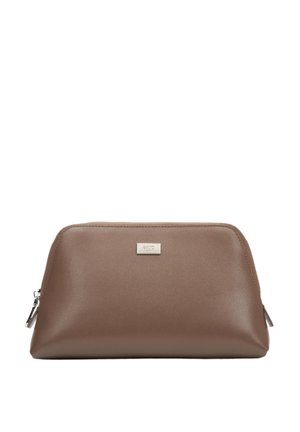 Brown synthetic cosmetic bag with a smooth texture, curved shape, silver logo accent, and zipper closure. Compact and practical design.