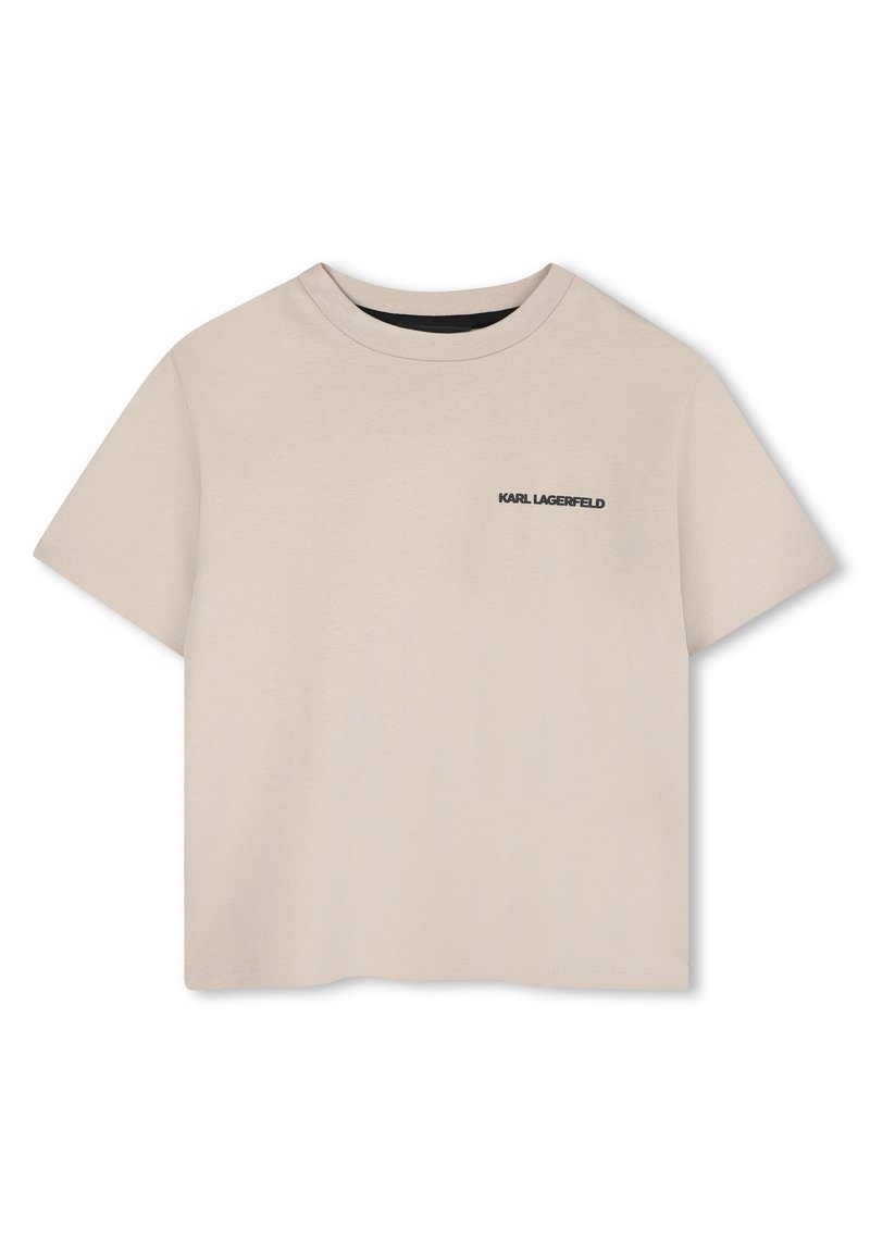 Beige cropped t-shirt van zachte katoen, met een ronde hals, korte mouwen en een zwart logo op de linkerborst.