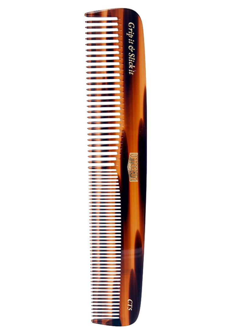 Tortoiseshell comb with a sleek design, featuring wide and fine teeth. The handle displays the brand "Grip it & Slick it" and unique accents.