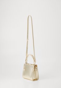 Tommy Hilfiger HERITAGE MINI SATCHEL - Torbica - gold-coloured