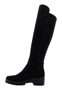 Bottes noires au-dessus du genou en matériau doux, dotées d'une semelle épaisse à finition texturée et d'un design élégant et ajusté.