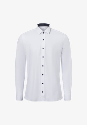 Langarm weißes Hemd aus Baumwolle mit einem normalen Kragen, marineblauen Knöpfen und einem gepunkteten Futter im Inneren des Kragens.