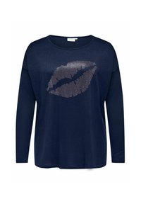 Granatowa koszula z długim rękawem i okrągłym dekoltem, z metalicznym wzorem ust pokrytych ćwiekami na środku. Wykonana z miękkiego, teksturowanego materiału.