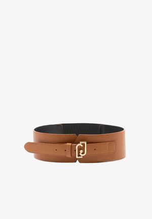 Large ceinture en cuir marron clair avec boucle entrelacée dorée et panneau arrière élastique noir pour un ajustement réglable.
