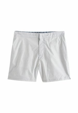 Badehose in Hellgrau mit Wellenlinienmuster. Elastischer Bund mit blauer Innenseite. Leichter, glatter Stoff. Länge bis zur Mitte des Oberschenkels.