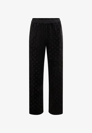 Pantaloni di velluto nero con un sottile motivo in rilievo. Presentano una vita elastica e un design a gamba dritta per il massimo comfort.