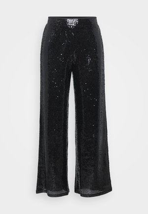 Pantalones de lentejuelas negros con un diseño de pierna ancha y cintura elástica, que presentan una textura suave y superficies brillantes que reflejan la luz.
