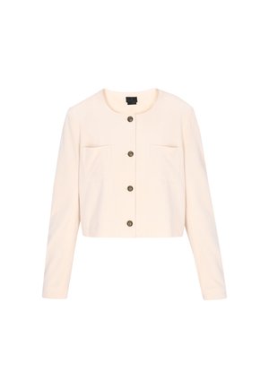 Kreemikarva väikese lõikega jakk ümmarguse kaelusega, pikad varrukad, kaks eest taskut ja neli musta nööpi keskel.