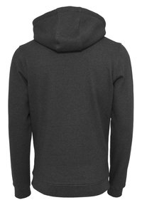 Dark gray hoodie with a drawstring hood, long sleeves, and a soft texture. Features a simple design with ribbed cuffs and hem.