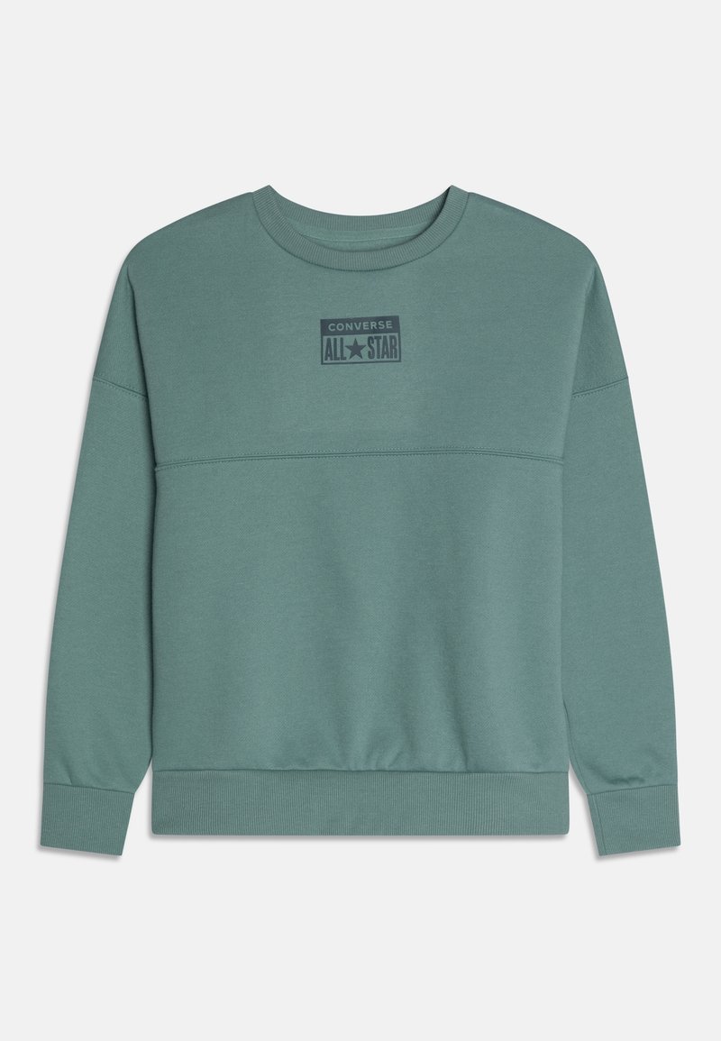 Zielona bluza z miękkiego materiału. Posiada okrągły dekolt, długie rękawy oraz naszywkę z logo z przodu. Prosty design, ściągacze przy mankietach.