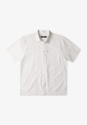 Short-sleeve white button-up shirt with a textured fabric, single chest pocket, and subtle brand logo detail.