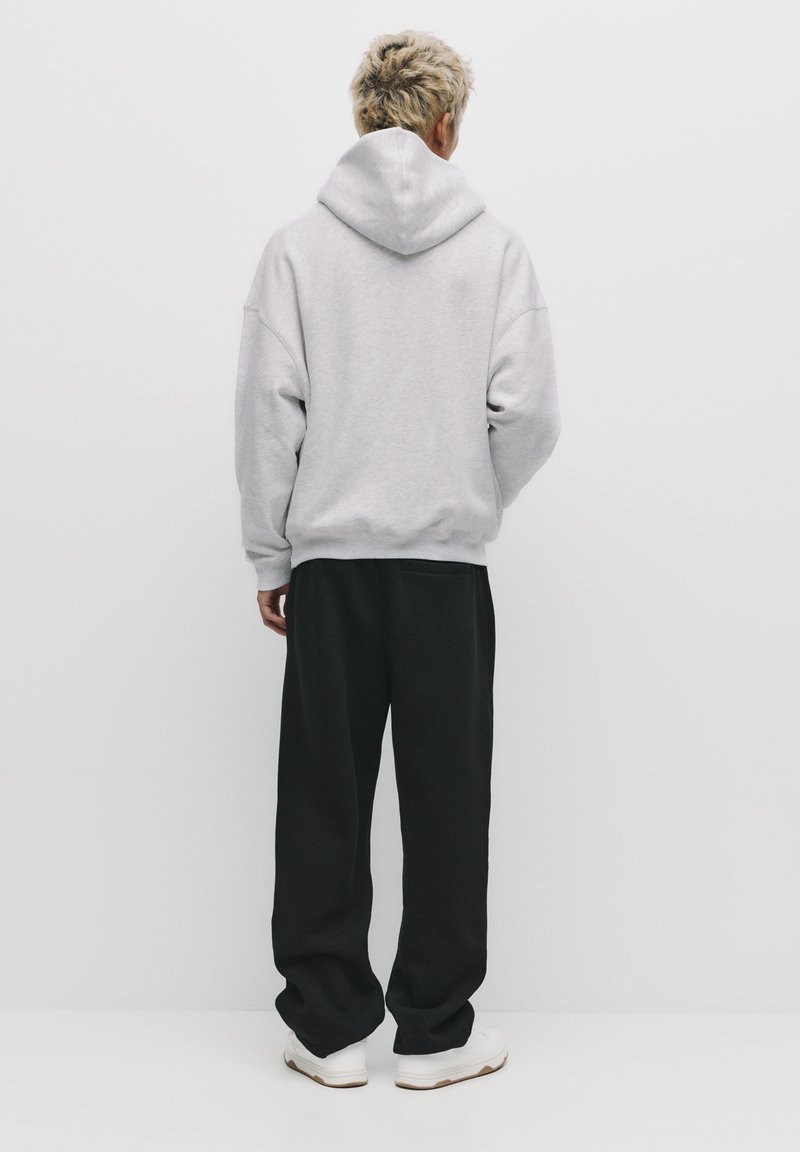 Pull&Bear - Sweat à capuche avec imprimé citrons au dos - Gris