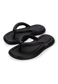 Infradito neri con una superficie liscia, caratterizzati da un design della cinghia ondulato e suole piatte. Nessun marchio evidente visibile.