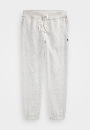 Graue Baumwoll-Sweatpants mit elastischem Bund, Kordelzug und gerippten Bündchen. Mit einem kleinen navy-farbenen Logo am linken Bein.