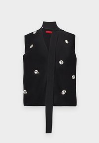 Chaleco sin mangas de punto negro con lazo delantero, adornado con grandes piedras de imitación redondas distribuidas por toda la tela.