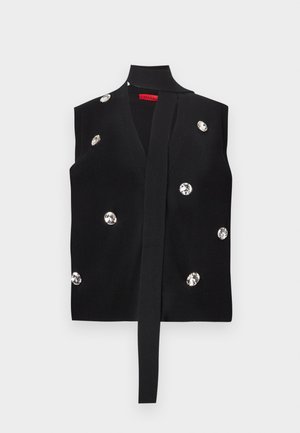 Black knitted sleeveless vest with a tie front, embellished with large, round rhinestones distributed across the fabric.