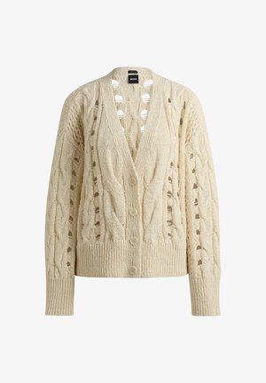 Kreemas krāsas adīta žakete ar V veida kaklu, atvērta kabeli adījuma dizains, seši pogas, kā arī ribota apakšmala un piedurknes ar izgriezuma detaļām.