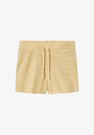 Világos sárga, textúrált mintás, kötött rövidnadrág, rugalmas derékkal és állítható zsinórral. Szegett szegély részlet.