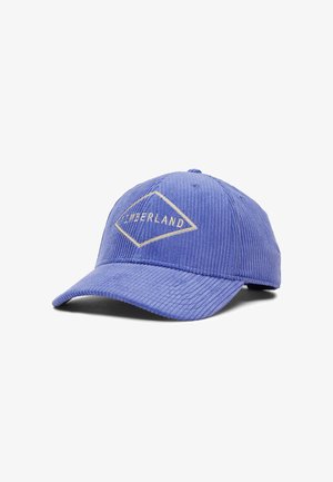 Gorra de pana azul con visera curva, adornada con un logo en forma de diamante bordado en texto beige claro, que garantiza un perfil estructurado.