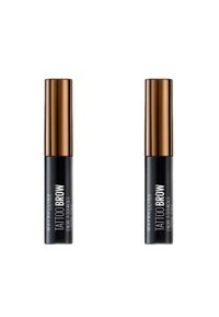 Deux tubes de teinture pour sourcils noirs avec des bouchons en bronze, étiquetés "Tattoo Brow" en texte blanc sur le corps noir. Texture lisse et mate.