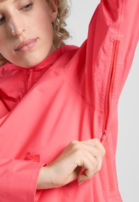 Jack Wolfskin Giacca hard shell - sunset coral