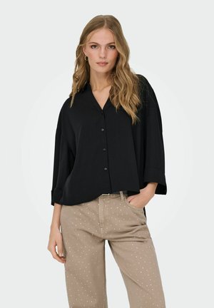 Blusa - black