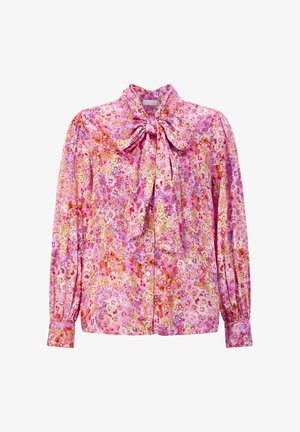 Long-sleeve blouse with pink floral pattern, button-down front, and large bow tie at the neck.