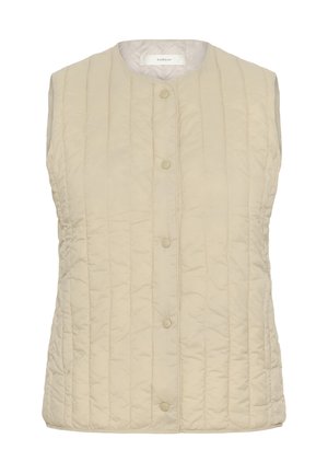 Beežist tikitud varrukateta vest vertikaalse õmblusega ja viie keskel asuva trukknapiga.