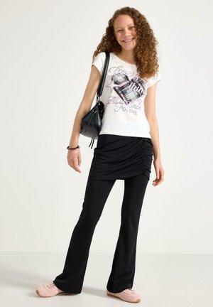 Lindex, LINDEX JERSEY TROUSERS WITH SKIRT LINDEX SET - Legging (type pantalon) - black